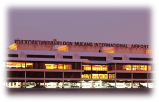 A building with lights on the outsideDescription automatically generated with medium confidence